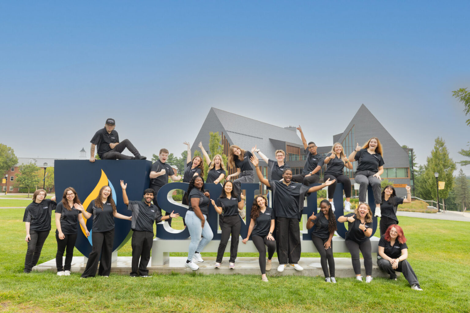 SHNU people on logo at the campus